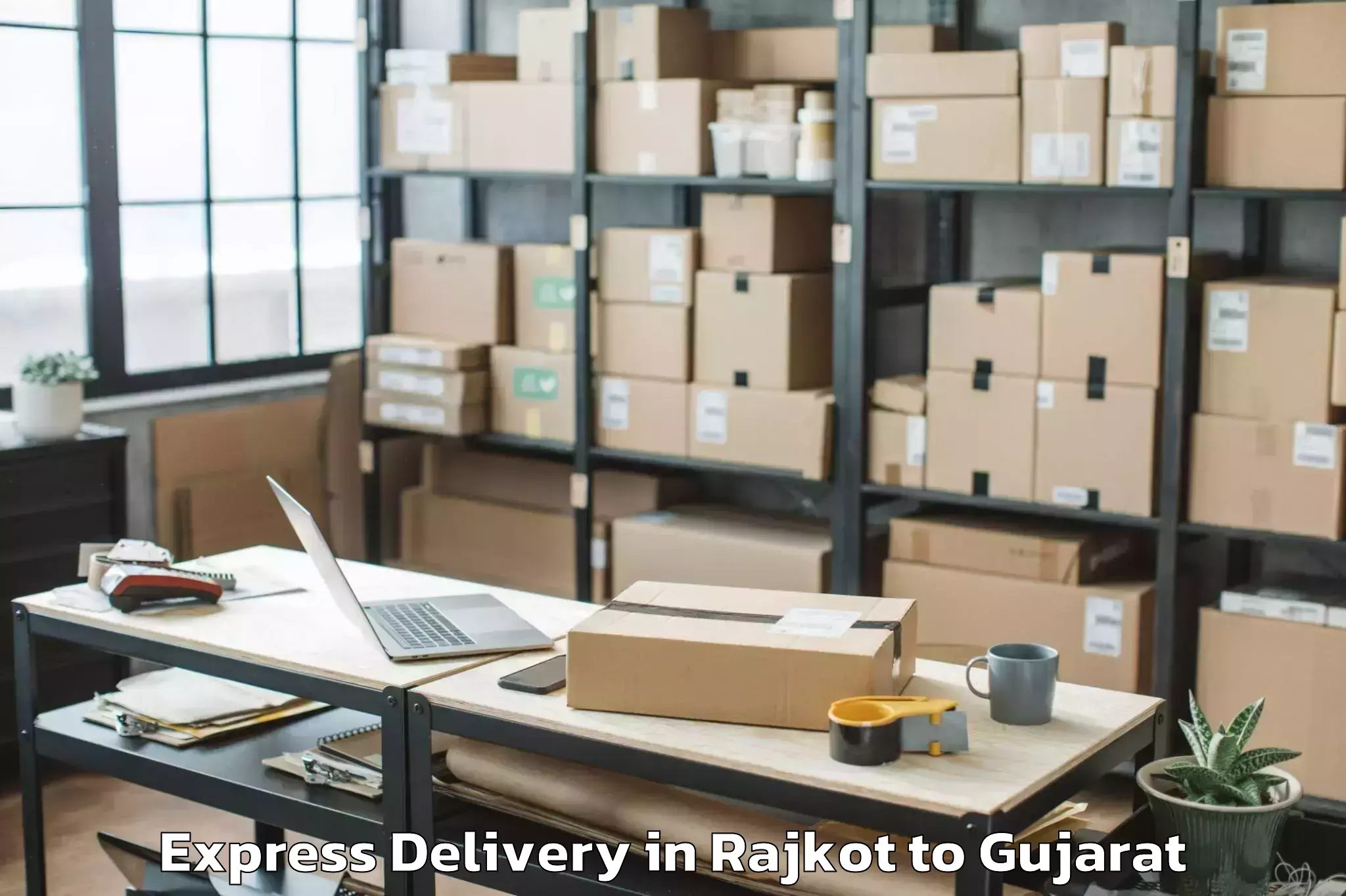 Affordable Rajkot to Hansot Express Delivery